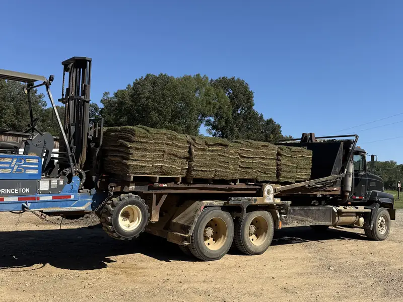 Paramount Sod Farm truck delivering pallets of sod with a piggyback forklift, Hernando MS